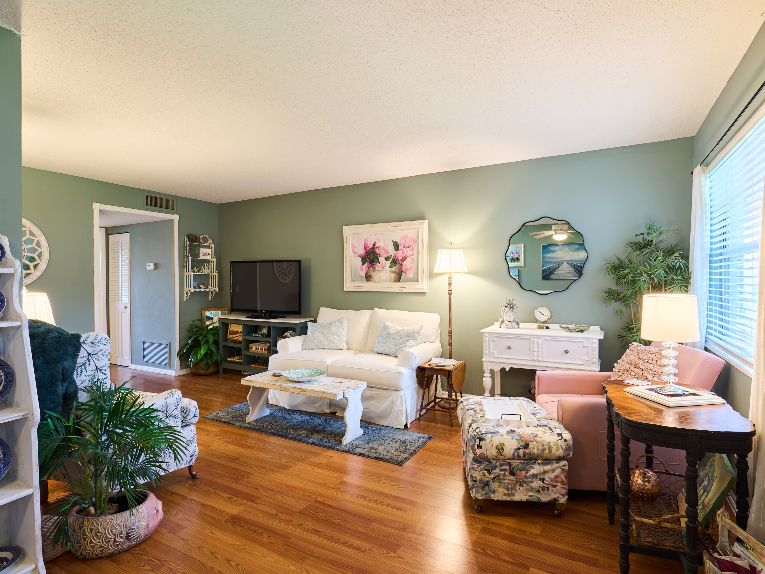 Updated living room in ground-floor Vista Pines condo for sale in Stuart, Florida